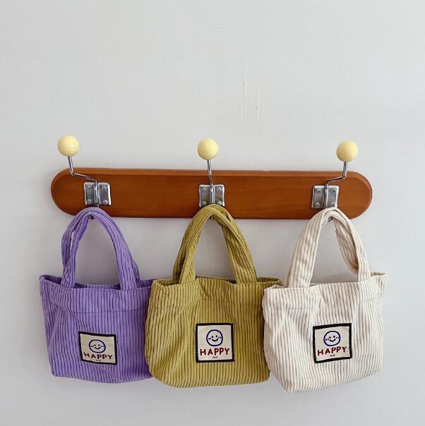 バッグ★子供用★ハンドバッグ★ミニバッグ★男女兼用★カジュアル★笑顔★4色